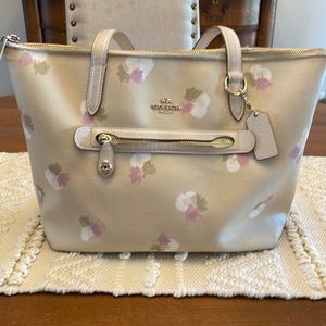 Coach bag with beautiful spring flowers